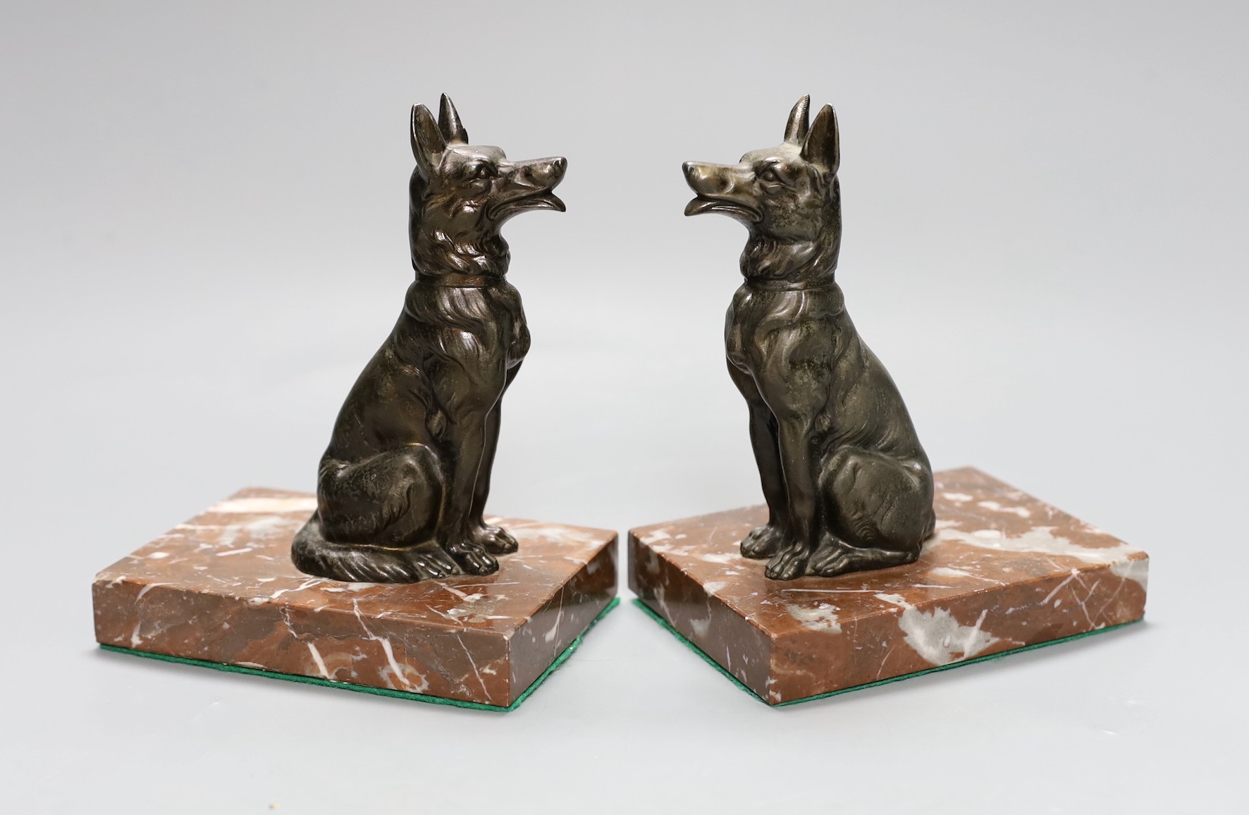 A pair of Art Deco spelter Alsatian book-ends, 16 cms high